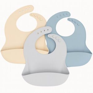 Soft Silicone Baby Bib Trio - Beige, Light Blue, and Light Gray.
